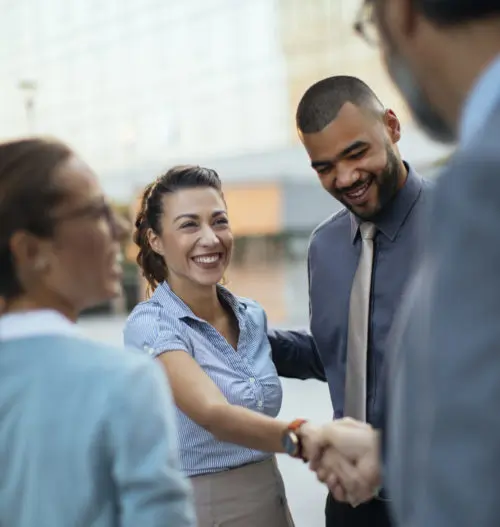 Doing Business in BC - business people shaking hands.