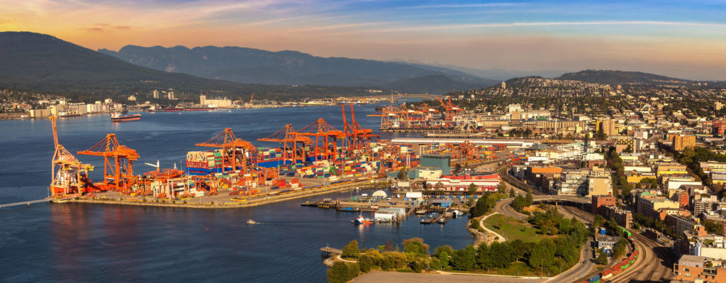 Panoramic aerial view of Vancouver Centerm Terminal - Container port terminal at sunset, Canada