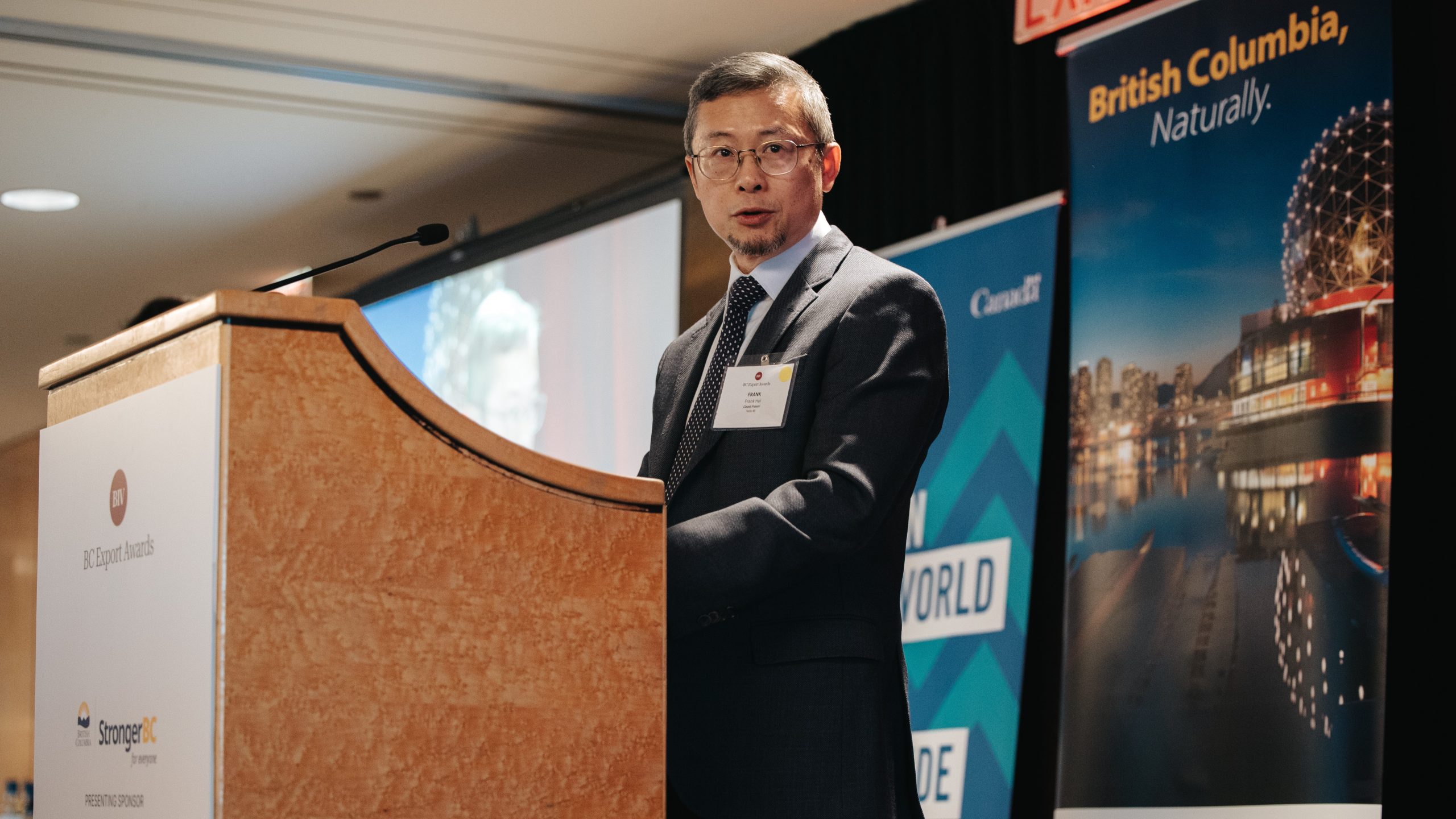 Coast Fraser President, Frank Hui at podium at the BC Export Awards