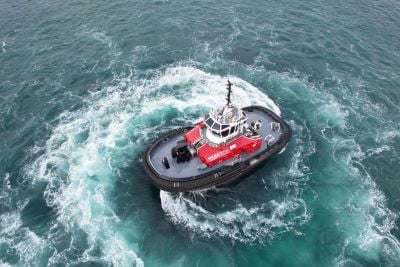 Birds eye view of a tug boat in water