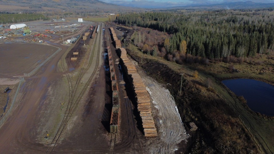 Lumber and rail tracks from birds eye view in rural BC