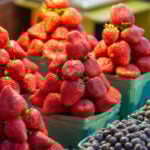 Baskets of strawberries and blueberries