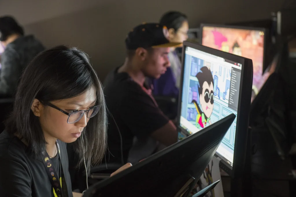 Digital Media Employees Working on Computers