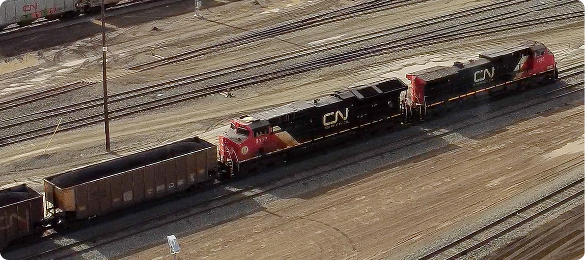 Drone shot of trains and railway in Prince Georg, Invest in Cariboo