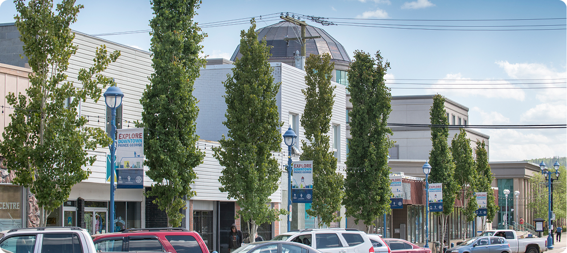 Downtown Prince George, rows of cars in front of businesses