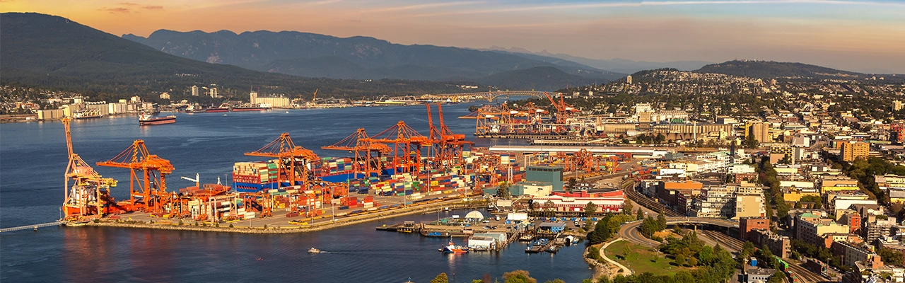 Panoramic aerial view of Vancouver Centerm Terminal - Container port terminal at sunset, Canada